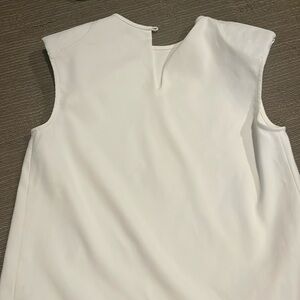 white dressy shirt with shoulder pads within never worn